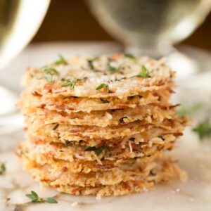 Close-up of golden, oven-baked Parmigiano Reggiano crisps made from imported Italian cheese aged over 4 years